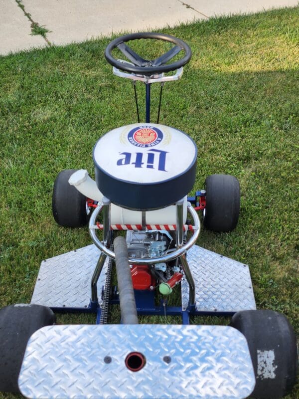 A close up of the seat on a go kart