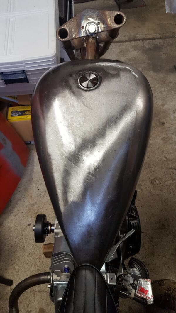 A close up of the top of a motorcycle tank