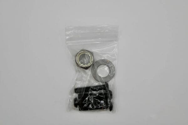 A bag of parts and a bearing for the front wheel.