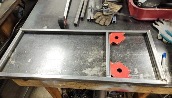 A table with some metal parts on it